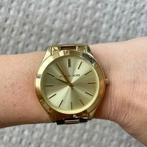 Michael Kors slim runway gold watch
